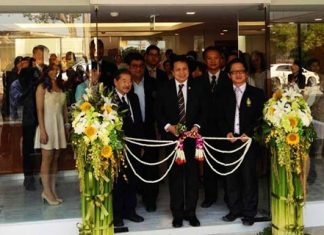 Officials cut the ribbon to officially open Samitivej Hospital’s new Occupational Medicine Center.