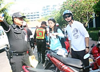 Go pay your fine at the police station over there on Soi 9.