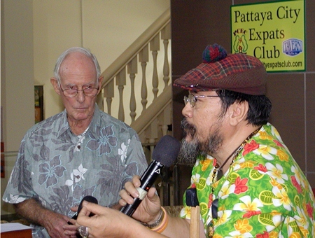 Member Sermsakdi updates members on forthcoming events in Pattaya and Chonburi; former chair Richard Smith looks on.