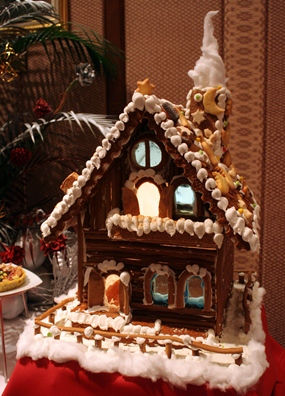 A beautiful gingerbread house on display.