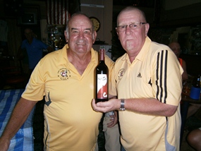 Mike Gosden (left) presents Peter Grey with his NAGA of the year trophy. 