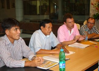 Pierre Antoine, President of the Petanque Kao-Rai Pattaya Club (2nd right), discusses preparations for the 3rd Petanque Star Masters Thailand tournament with club members and officials at Pattaya City Hall, Dec. 11.