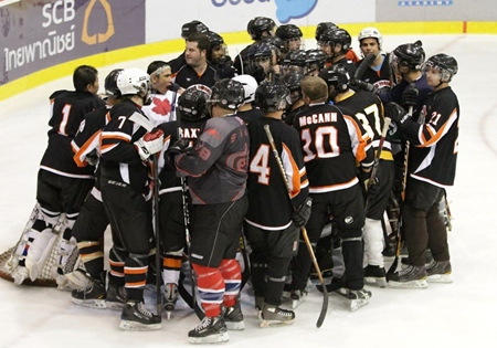 Team Canada rally at their net.