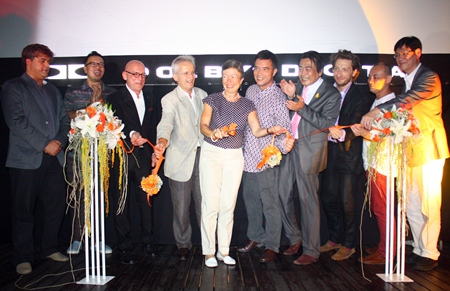 Catherine Viteau (center) cuts the ribbon to officially open the month long movie festival. Catherine is flanked by husband and French Ambassador to Thailand Thierry Viteau, Ronakit Ekasingh, deputy mayor of Pattaya, Serm Phenjati, owner of the dusit D2 hotel, movie producer Regis Ghezelbash, Kriengsak Silakong, Director of the World Film Festival of Bangkok, Prasong Nitinavakorn, Shop Operations Manager for King Power Pattaya, and Tony Malhotra, Deputy Managing Director, Pattaya Mail Media Group