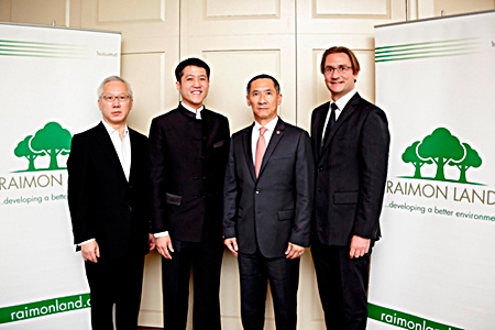 (From left) Raimon Land Directors Johnson Tan and Lionel Lee pose with company Chairman, Pradit Phataraprasit, and Chief Executive Officer, Hubert R Viriot.