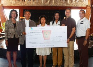 Andre Brulhart (2nd right), GM of Centara Grand Mirage Beach Resort Pattaya presents a donation of 25,000 baht to Rev. Peter Pattarapong Srivorakul (2nd left), President of the Father Ray Foundation in Pattaya and Ajima Chavalit-Thamrong (3rd left), Fundraising Manager. The funds were raised during the hotel’s 3rd anniversary celebrations and annual Christmas Tree Lighting Ceremony in 2012. Other staff members at the presentation included Usa Pookpant, Public Relations Manager; Sukanya Wongdornma, Financial Controller and Wuthisak Pichayagan, Executive Assistant Manager F&B.
