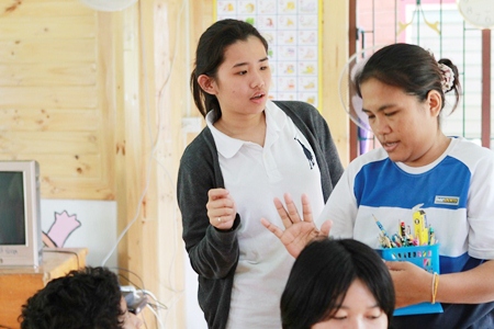 One of the IB students helps at the special school.