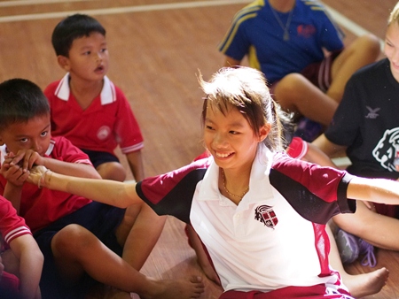 Playing with the students from the local community.