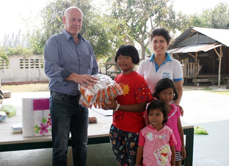 Tulip Group’s business development chief Keith Fathers presents some much needed food items to children at the CPDC.