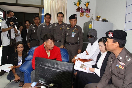 Alleged serial rapist Petty Officer 1st Class Anek Duangfoong (seated, center) has been arrested.