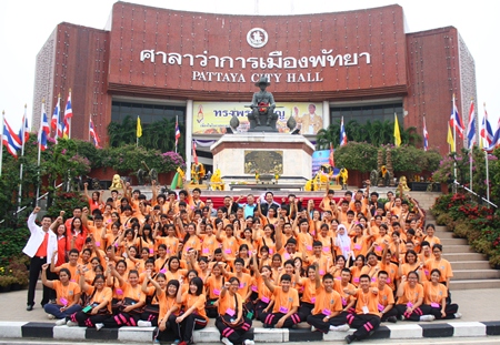150 youths pose for a picture with Pattaya administrators in front of City Hall before heading to Sattahip.