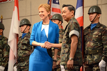 U.S. Ambassador to Thailand Kristie Kenney, left, poses with Thai Army Gen. Yuthana Phagpolngam, deputy chief of Defense Forces for the Royal Thai Army, during the opening ceremony of exercise Cobra Gold 13 in Chiang Mai, Feb. 11. Cobra Gold includes development projects such as building schools & providing medical care throughout Thailand. (U.S. Army photo by Spc. Catherine Sinclair/Released)