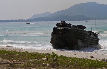 An amphibious assault vehicle from Company A., Battalion Landing Team 1st Battalion, 5th Marine Regiment, 31st Marine Expeditionary Unit, climbs on to a beach during an amphibious assault for exercise Cobra Gold 2013 Feb. 14. (Photo by Lance Cpl. Codey Underwood)