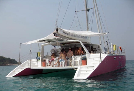 PCEC Blue Water Sailing group enjoys their time aboard the Rhumba, a 52 foot catamaran out of Ocean Marina before visiting the beaches of Koh Sak and Koh Pei during their day sail outing.