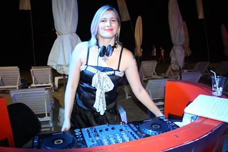 DJ Olga Ola mixes the tunes for the party. 
