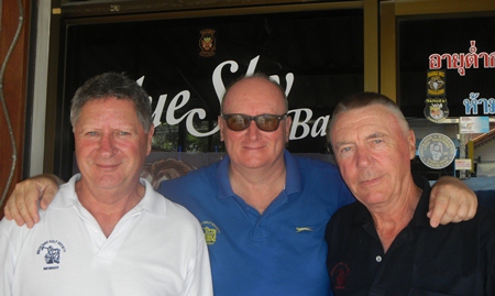 Winners pose outside The Blue Sky Bar.