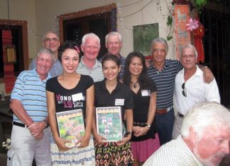 Tuesday’s winners pose with staff at The Relax Bar.