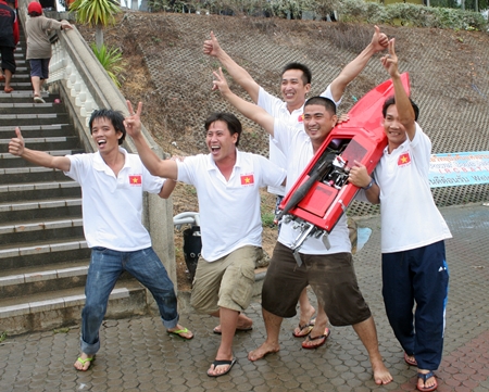 The Vietnam team celebrate after winning the Class G category.