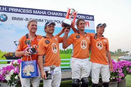 The victorious Thai Polo team raise the HRH Princess Maha Chakri Sirindhorn Cup after winning an exciting final at the BMW- B.Grimm Thai Polo Open.