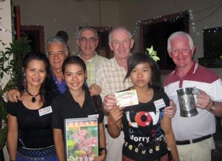 Tournament winners pose for a photo with The Relax Bar staff.
