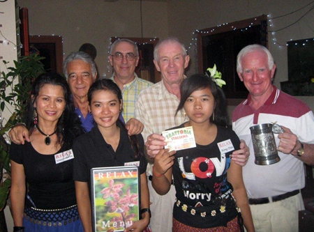 Tournament winners pose for a photo with The Relax Bar staff.
