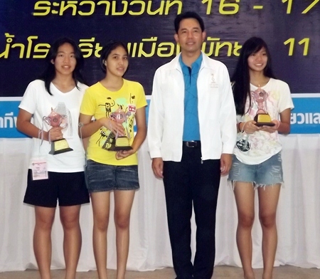 Winners in one of the junior female categories receive awards from Pattaya Mayor Ittipol Kunplome.