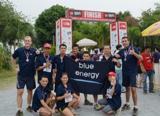 Hilton Pattaya team members pose for a photo after completing the North Face 100 Thailand adventure race.