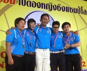 The victorious Thailand team pose with their coach after winning the 2nd Marathon Pentaque Women’s Confederation Cup 2012.