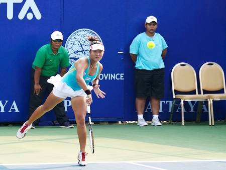 Varunya Wongteanchai serves during the quarter-final doubles match against Irina Buryachok and Valeria Solovyeva.