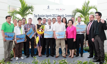The Royal Cliff Hotels Group held a gathering to thank and honour the top Russian travel agents recently. On hand to welcome them were Group Managing Director Panga Vathanakul (4th right), Vice-President Vathanai Vathanakul (right), Director of Sales & Marketing Victor Kriventsov (second row, 4th right) and Counselor Andrey Dvornikov, Head of the Consular Section, Embassy of the Russian Federation to Thailand. The Royal Cliff Hotels Group held a gathering to thank and honour the top Russian travel agents recently. On hand to welcome them were Group Managing Director Panga Vathanakul (4th right), Vice-President Vathanai Vathanakul (right), Director of Sales & Marketing Victor Kriventsov (second row, 4th right) and Counselor Andrey Dvornikov, Head of the Consular Section, Embassy of the Russian Federation to Thailand.