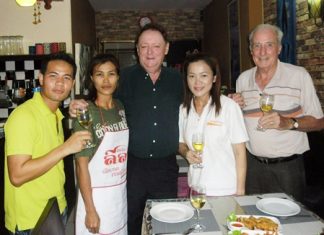 Enjoying a fun evening at the Hot Chilli Restaurant (View Talay 2B) recently were the restaurant manager Pasit Foobunma, Chef Noi, Bon Vivant Allan Riddell, Som Corness celebrating the end of one semester and Dr. Iain, critically sampling a South African wine.