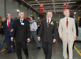Crown Prince Philippe (right) and a delegation of Belgian officials and business leaders tour Rayong’s Maptaput Industrial Estate.