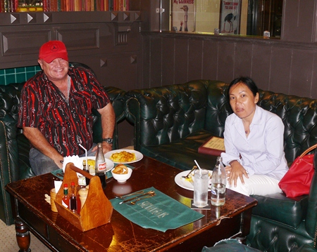 The library has booths with deeply padded button upholstery for dining as well as drinking.