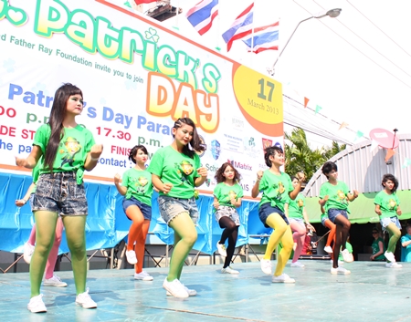 Children from Redemptorist Foundation perform some “Irish” dance moves outside Alcazar Theatre on St. Patrick’s day before the parade began.