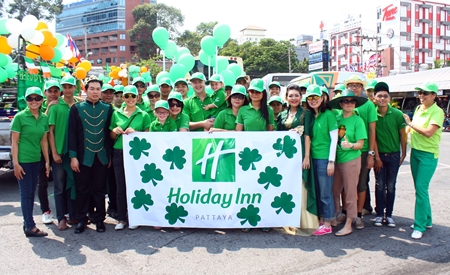 Holiday Inn Pattaya employees, led by Garth Solly (center), take part in the St. Patrick’s Day festivities.