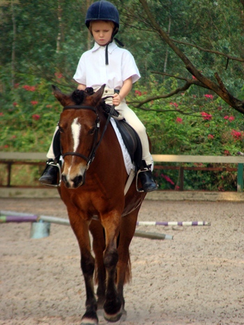 A GIS student keeps control of her horse at the gymkhana.