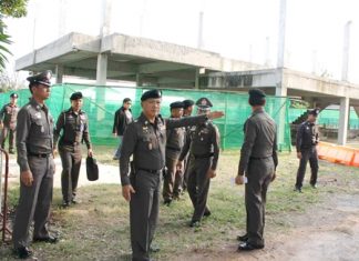 Gen. Adul Saengsingkaew (arm extended) visits the Plutaluang construction site, which still has a long way to go before it is ready.