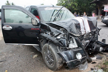 The driver of this pickup allegedly ran a red light, killing one person and injuring three others.