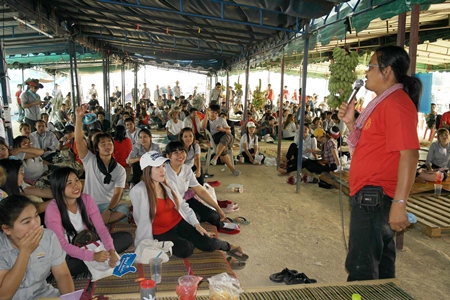 Some of the striking workers are airing their grievances under the cover of shade, whilst the others are protesting in front of the factory.