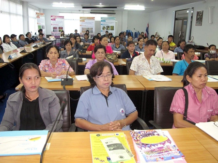 Cooks and vendors listen to a lecture about food-safety laws in Sattahip.