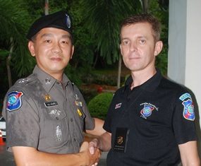 The superintendent of Pattaya’s tourist police, Lieutenant Colonel Aroon Promphan (left), has announced the appointment of Wayne Walton to be the new group leader of Pattaya’s Foreign Tourist Police Assistants (FTPA). Wayne, 45, has many years’ experience of UK policing including UK Royal Protection, and additional experience in the private sector organizing Close Protection for various dignitaries. Wayne said, “I am honoured to take over leadership of FTPA in Pattaya following the resignation of Rey Dominguez who will be spending more time in the USA. I hope to involve many more people in FTPA in the future to make the team more dynamic and professional.” He explained that the 45 member-strong FTPA had a priority to recruit more Russian-speaking members in view of the changing visitor profile on Walking Street. The role of the auxiliary FTPA is to assist the regular tourist police, principally at the mobile unit on Walking Street, dealing with general tourist questions as well as assisting with visitors’ difficulties and helping to keep public order as and when necessary. They also work with Thai tourist police volunteers. In recent years, FTPA has attempted to become more professional with a lengthy induction programme and regular ongoing training and meetings. Applicants must possess a one year visa in Thailand and have police clearance from their home country. There is a strict disciplinary code and a detailed manual of correct procedures. Most FTPA have police, army or security backgrounds or have other relevant skills such as foreign language fluency or diplomatic experience. Barry Kenyon, the press officer said, “Most people remember the famous TV series Big Trouble in Thailand, but FTPA has evolved in many ways since then. Wayne has a big task ahead in ensuring the organization is progressive and up-to-date, but he’s surely the right man for the job. Pattaya is now attracting huge numbers of Russian, Indian and Chinese tourists and our structures need to take account of that.”