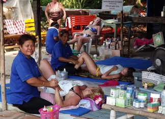 Chanhom Ngamdee quit her permanent job to join other women on Wong Amat Beach, laying mats to offer mobile massage and beauty services.