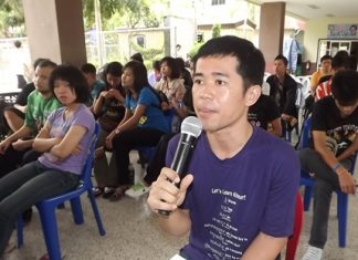 A student addresses Rattanachai Suthidechanai (not shown), requesting the mayor solve the footpath and mini-buses issues in Pattaya.