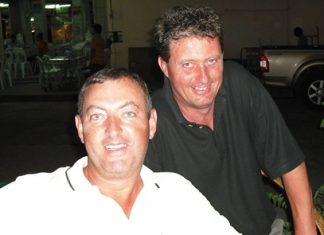 Mike Lloyd (front) gets some tips on how to lose less balls, from visiting teaching pro Keith Smithson.