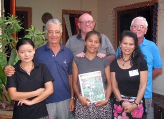 Tuesday’s winners pose with staff members at The Relax Bar.