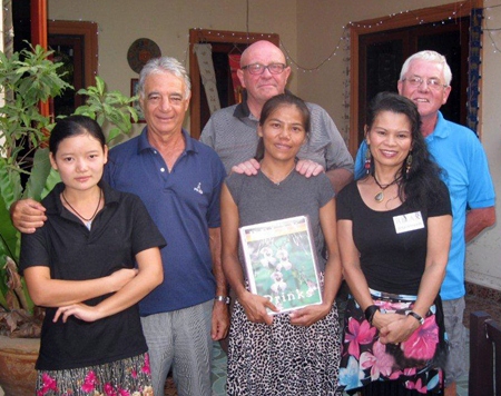 Tuesday’s winners pose with staff members at The Relax Bar.