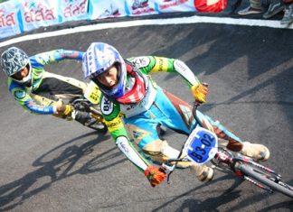 Taking a curve at high speed – all part of BMX racing.