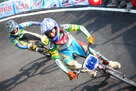 Taking a curve at high speed – all part of BMX racing.