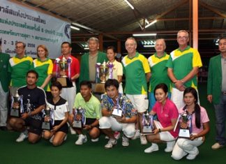 Winners pose with their trophies alongside organizers and officials at the Thailand Lawn Bowls National Singles tournament held at Coco Club Resort, Pattaya, Sunday, March 3.