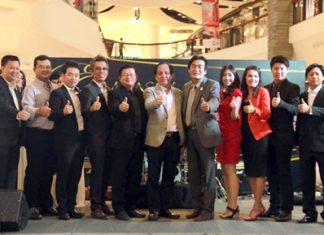 Management of property developer Angel Ken & Sky pose with Pattaya City officials at the “thank you” party held March 11.